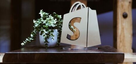 Shopify logo as a display on a table