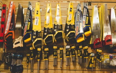 Many tools hanging on a shelf