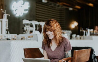 Person in a lounge with a laptop