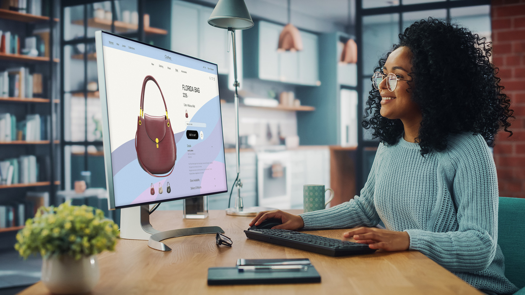Woman looking at a bag on a computer